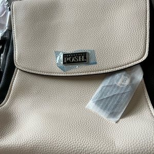 Brand new backpack style purse. Comes with dust cover. Light pink color.